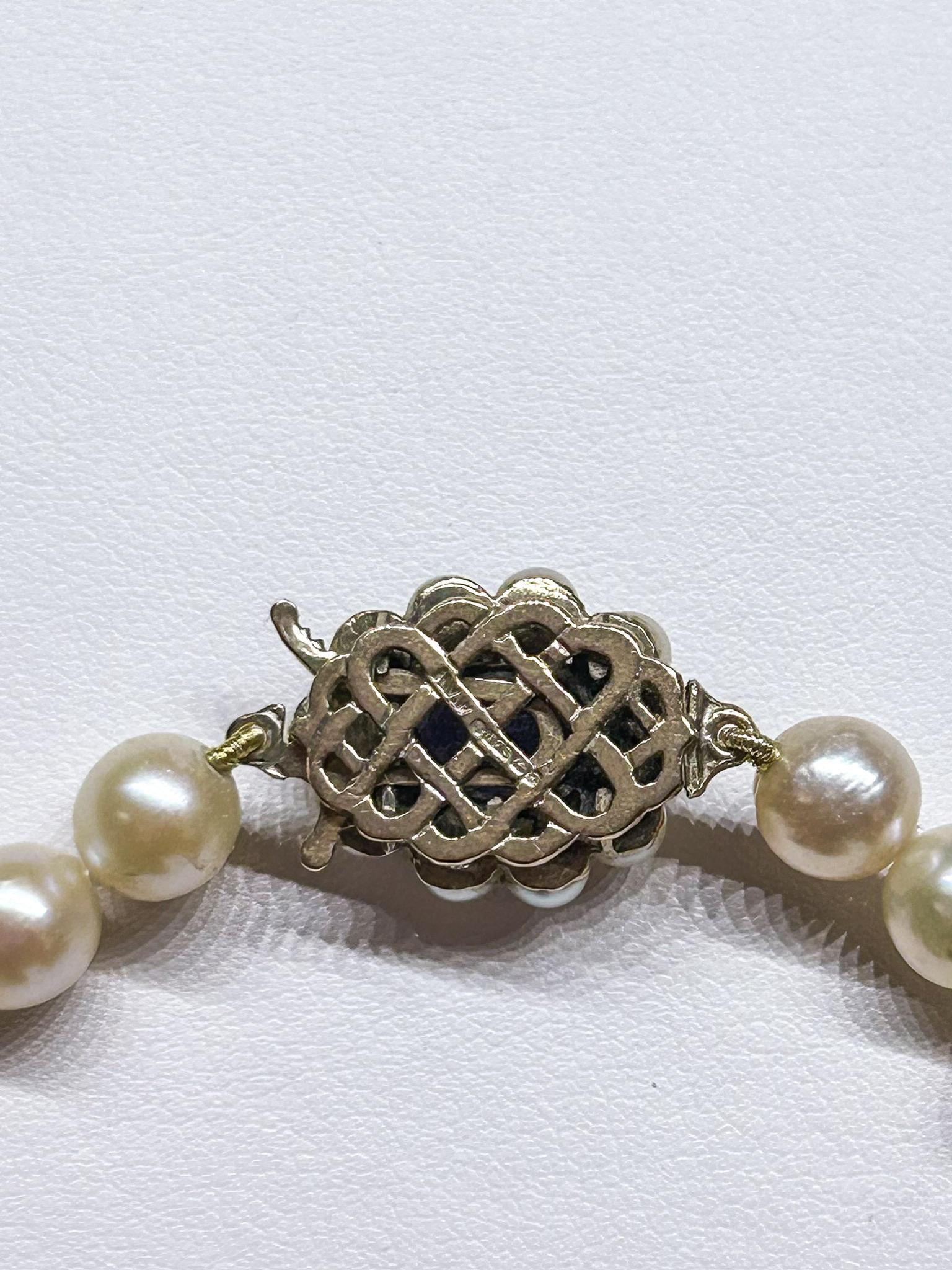 Pearl Necklace with Amethyst and Pearl Clasp