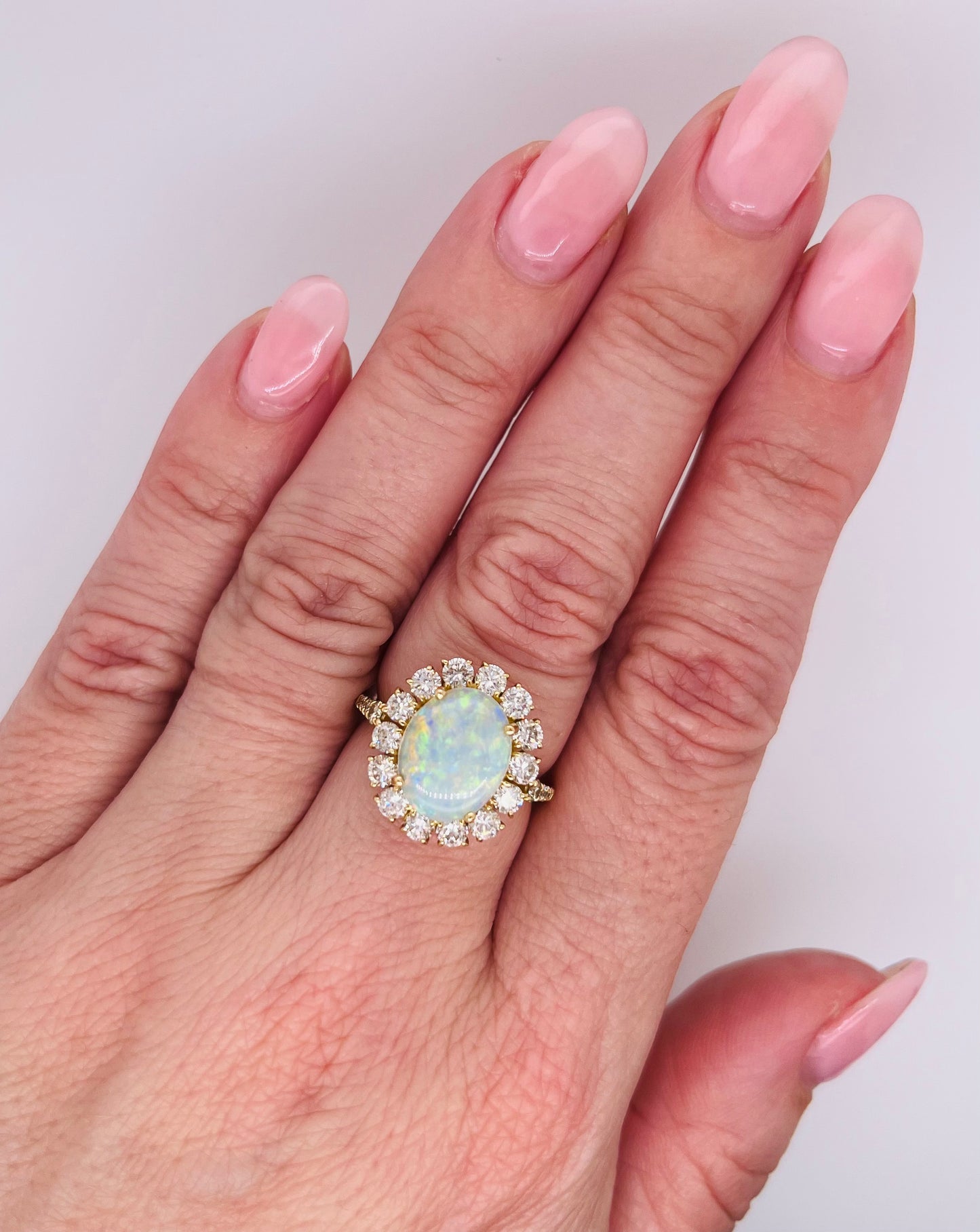 Vintage 18K Yellow Gold Opal and Diamond Halo Ring