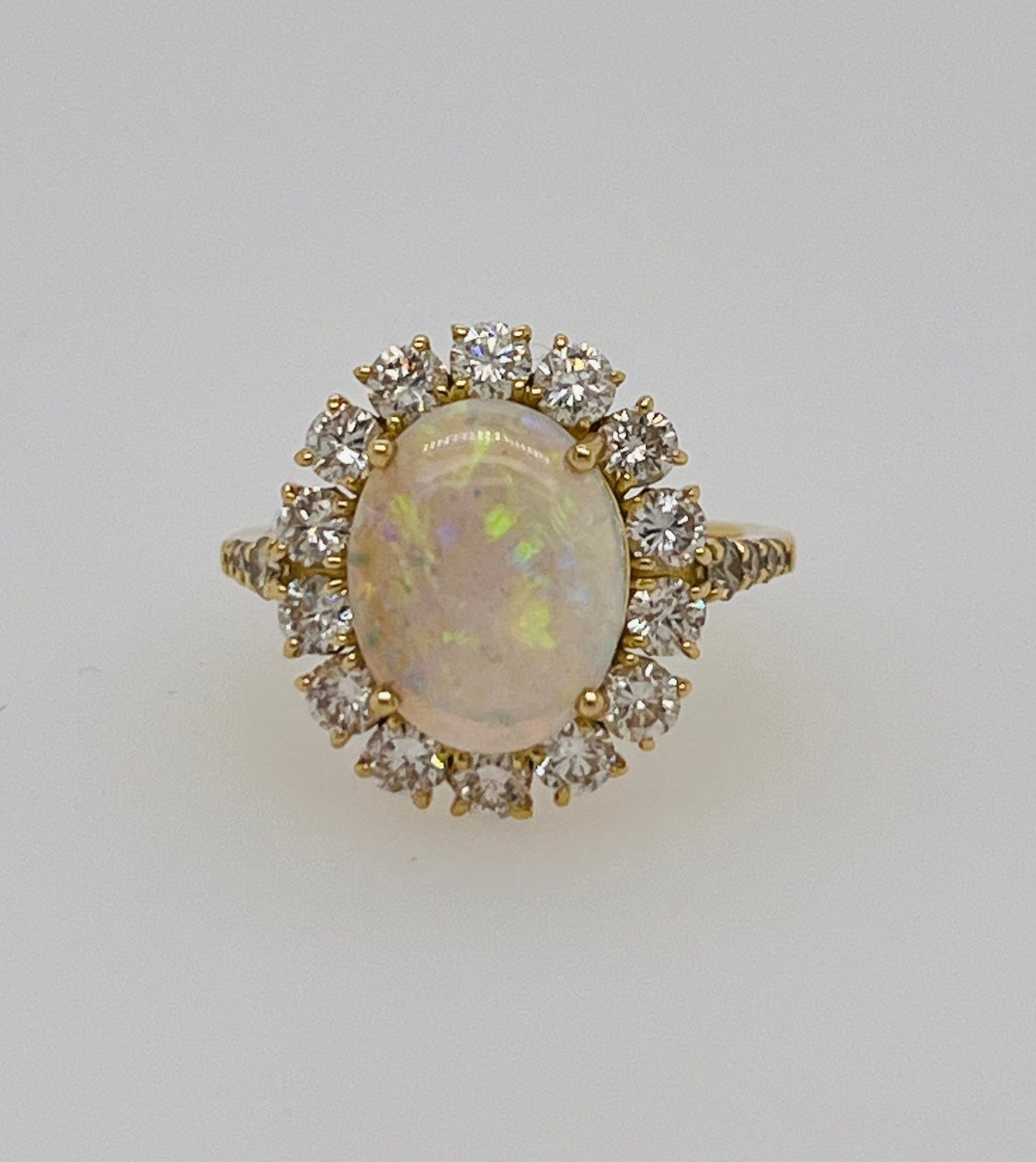 Vintage 18K Yellow Gold Opal and Diamond Halo Ring