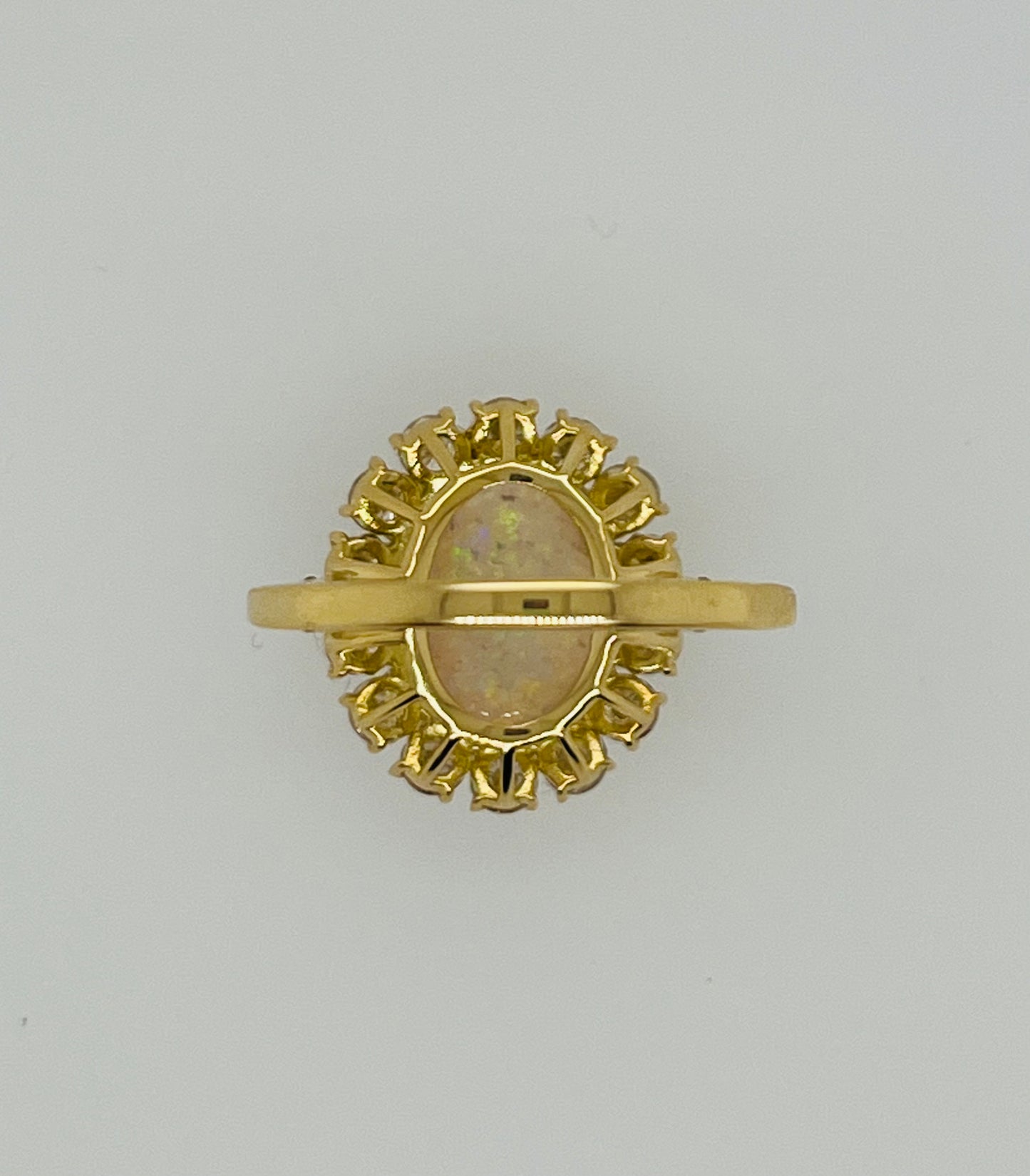 Vintage 18K Yellow Gold Opal and Diamond Halo Ring