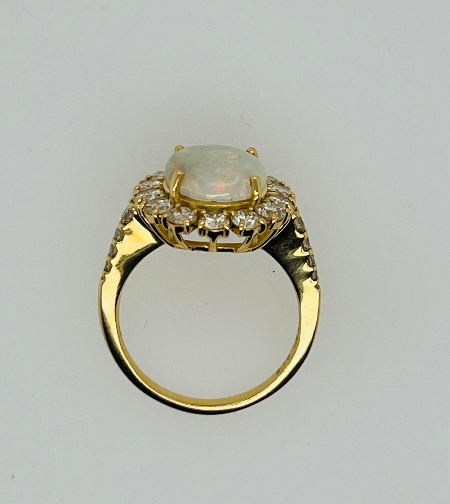 Vintage 18K Yellow Gold Opal and Diamond Halo Ring