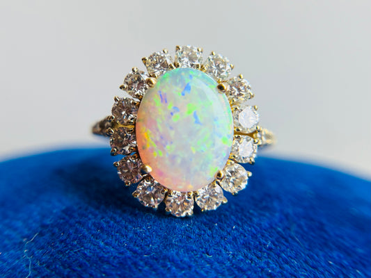 Vintage 18K Yellow Gold Opal and Diamond Halo Ring
