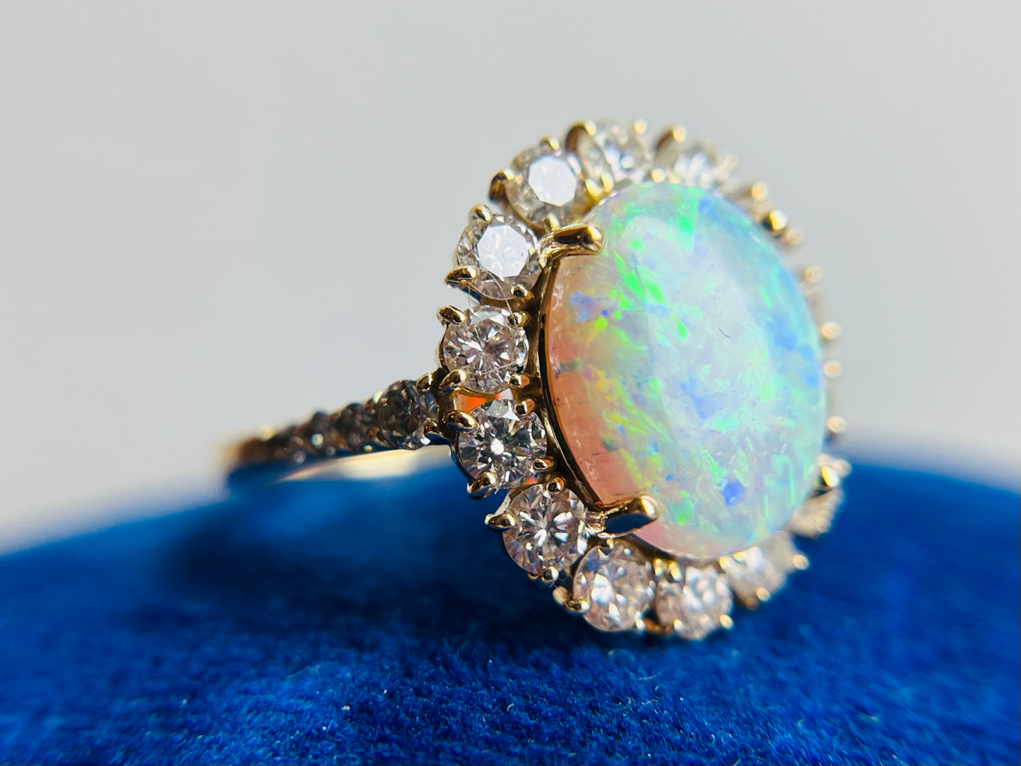 Vintage 18K Yellow Gold Opal and Diamond Halo Ring