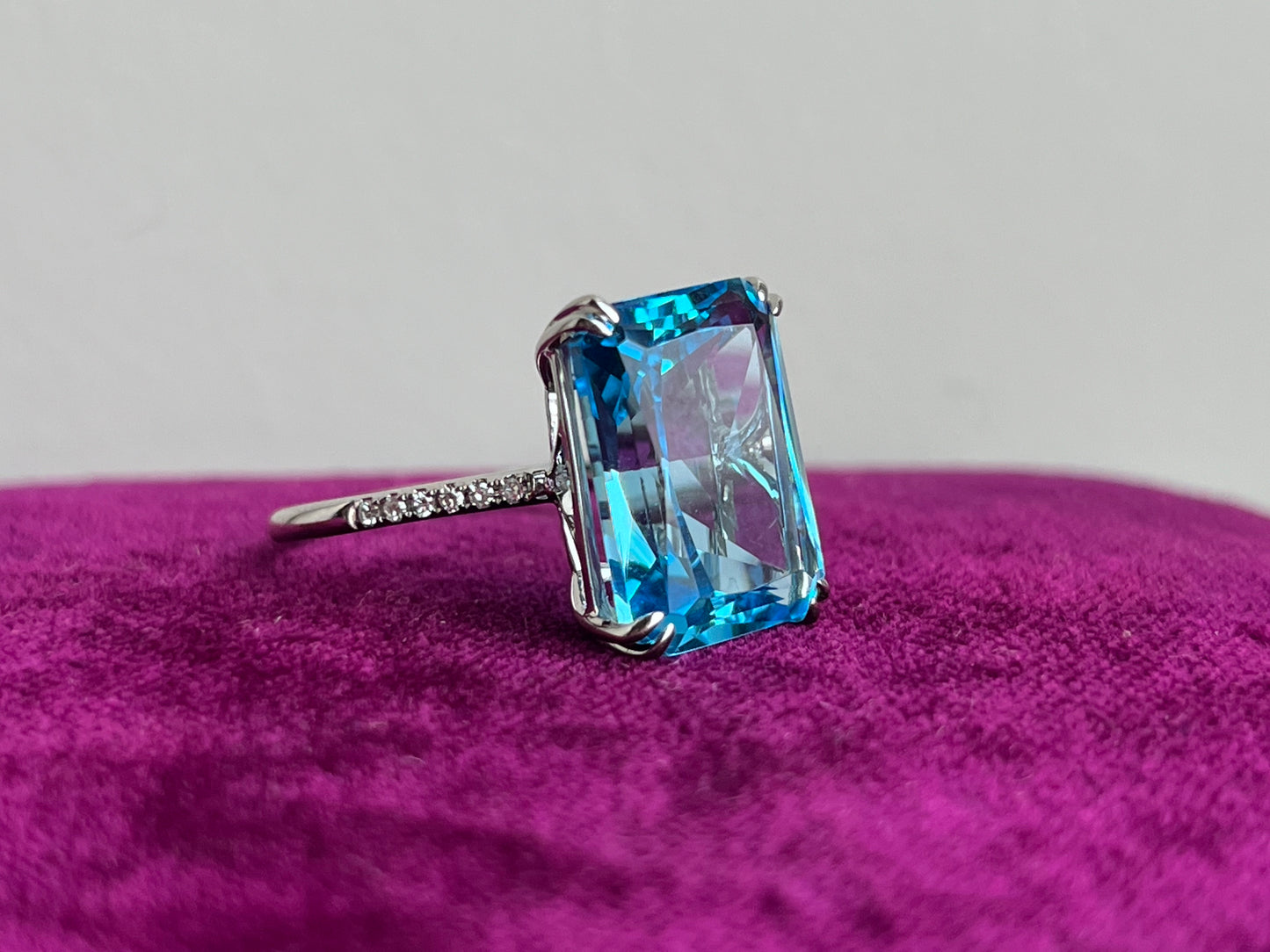 Emerald Cut Blue Topaz and Diamond 14k White Gold Ring