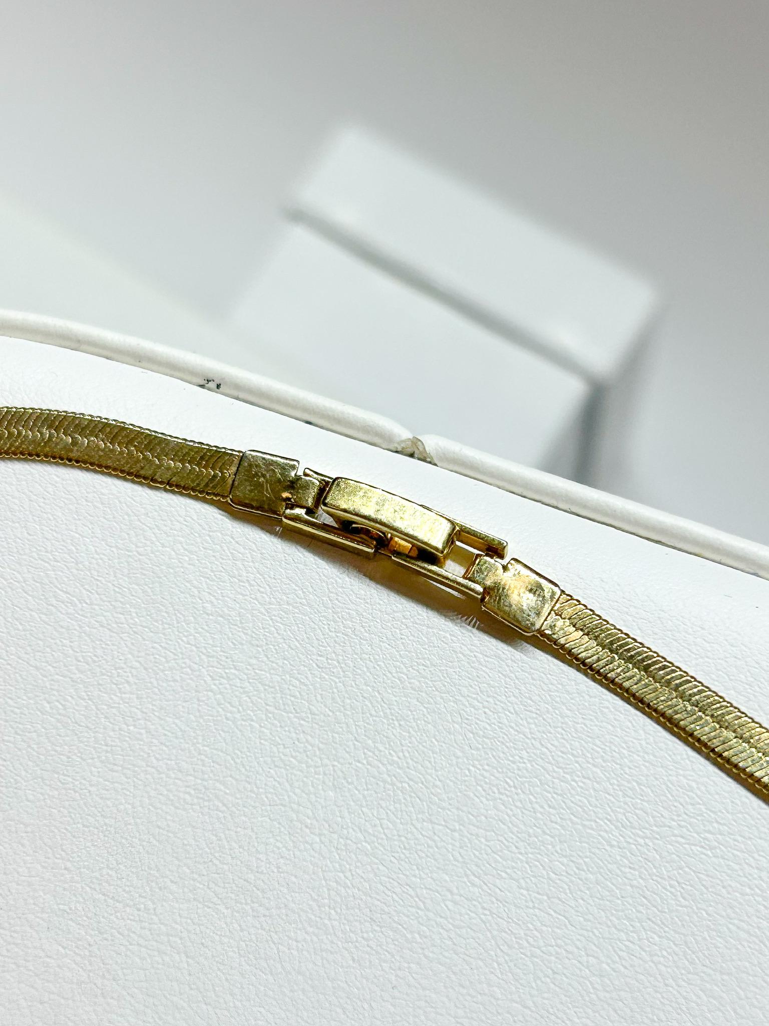 Avon Bow Herringbone Necklace
